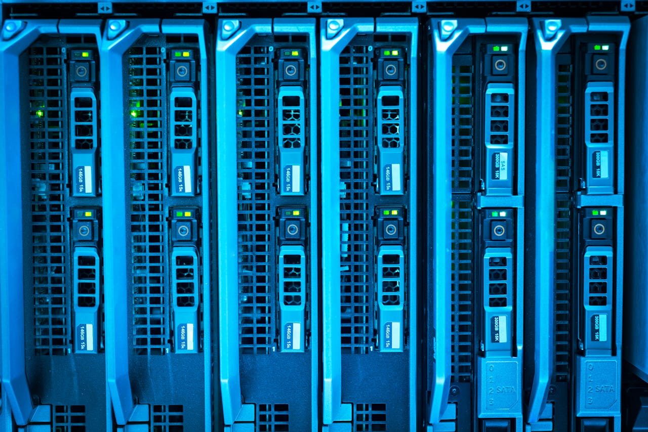 why-choose-us Detailed image of illuminated server racks showcasing modern technology infrastructure.